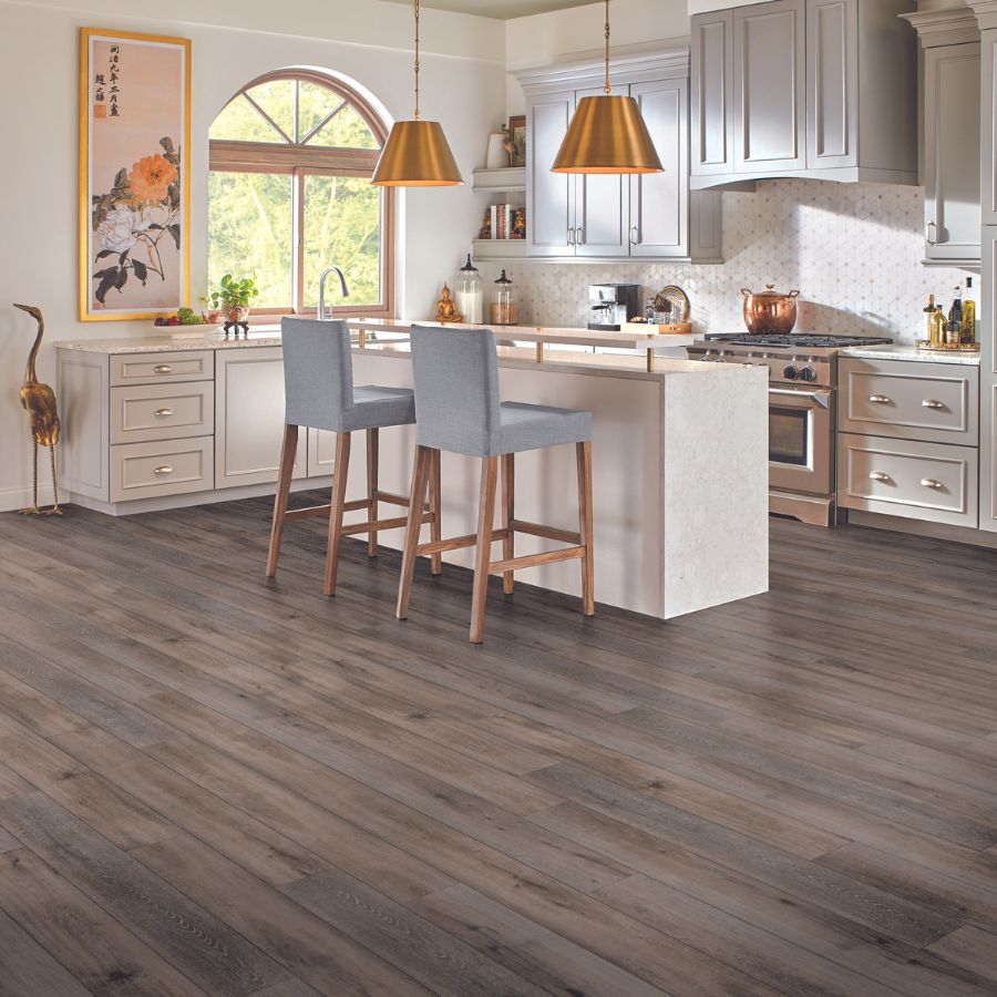 rustic wood look luxury vinyl plank floors in a charming kitchen